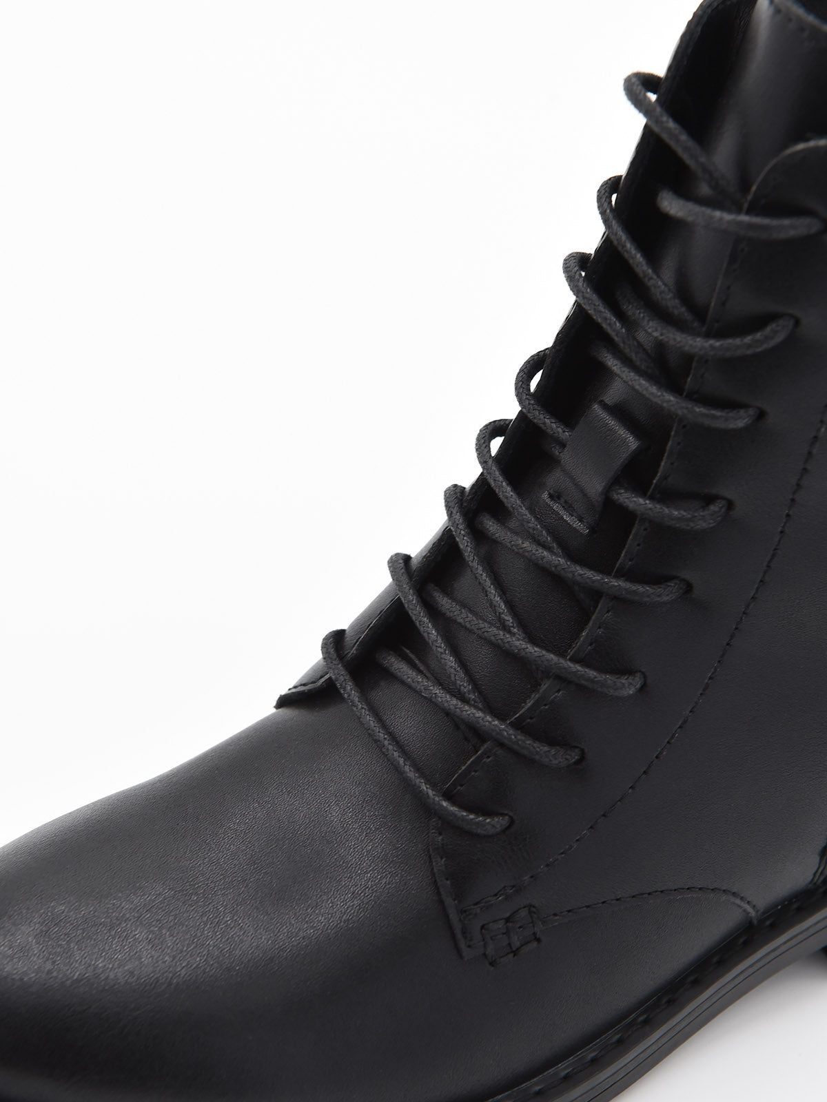 Botín negro de piel planos con cordones y cremallera lateral